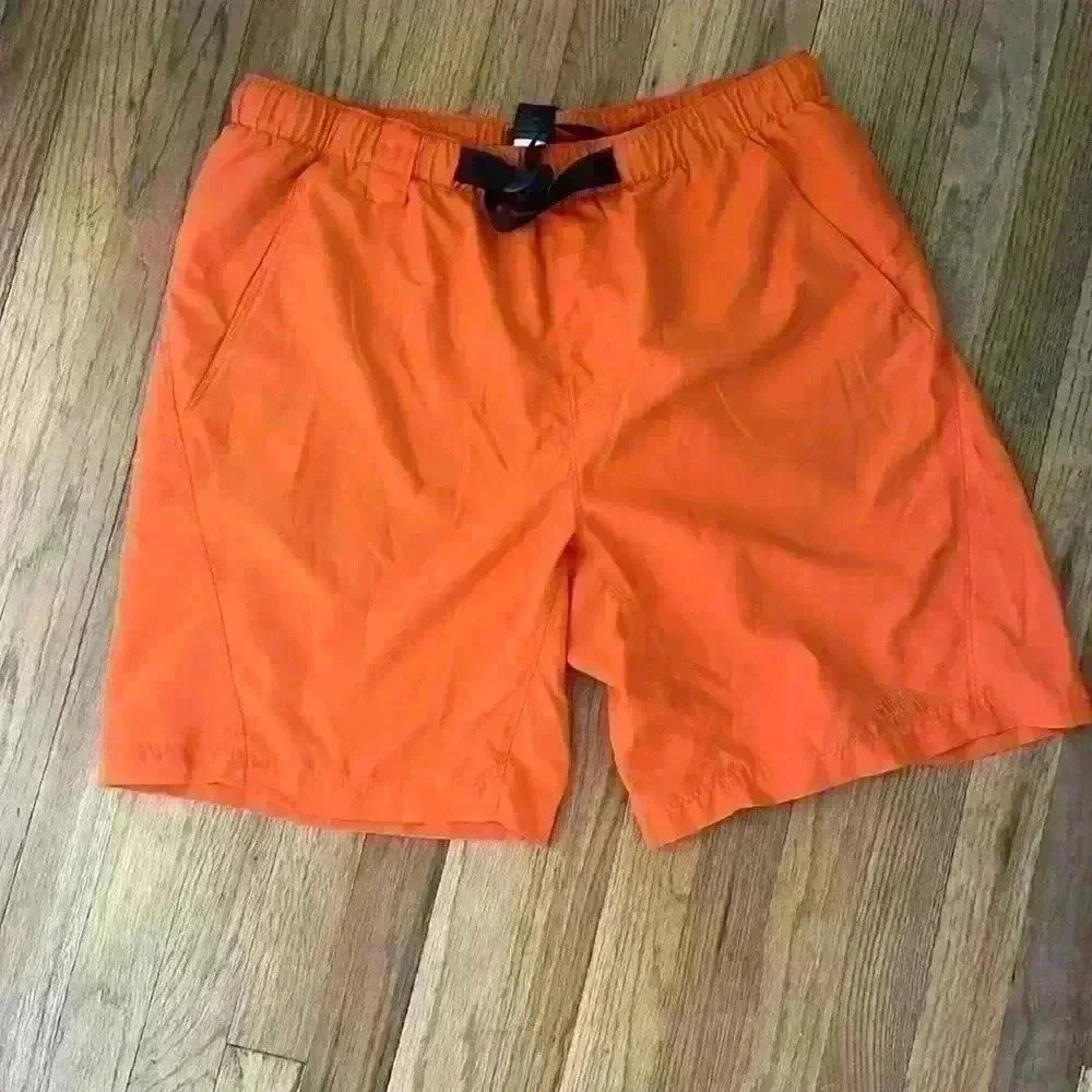 Men’s North Face orange swim suit; size L